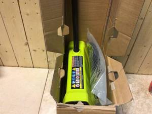 lot 84 image: RYOBI Expand-It 12 in. Snow Thrower Attachment Customer Returns See Pictures