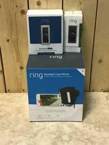 lot 96 image: Ring Spotlight Cam Wired (Plug-In) Outdoor Rectangle Security Camera, Black Customer Returns See Pictures