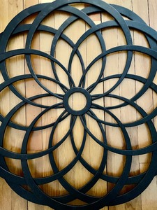 lot 28 image: Circular Metal Wall Decor