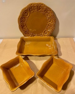 lot 215 image: Lovely Mustard Colored Three Piece Set of Serving Dishes