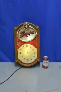Strohs Moving background lighted clock