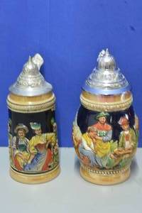 Lot of 2 outside sitting Steins
