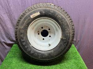 lot 79 image: New 20565-10 LRB 5 Hole Rim & Tire