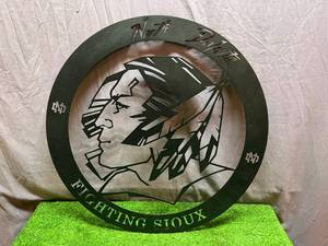 lot 175 image: UND Fighting Sioux Metal Die Cut Sign