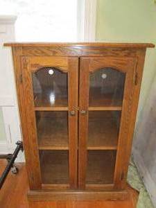 Oak Cabinet with Glass doors.