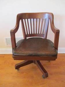 Antique Vintage Heywood Wakefield Oak Desk Chair with leather chair pad.