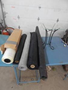 3-Rolls Of Screen, 1-Roll Of Fabric, 1-Roll Of Plastic & Small Glass Table
