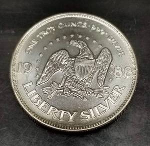1 TROY OZ .999 FINE SILVER 1988 A-MARK ROUND