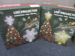 2 LED Projector Tree Toppers...