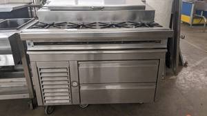 lot 28 image: Stainless Steel Commercial Refrigerated Prep table with drawers and 4 Burners-41 x 48 x 38