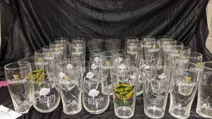 lot 266 image: Thirty-seven 17 Ounce Beer Glasses- Guinness, Crispin Cider Co. , Deschutes Brewery, and Grain Belt Beer