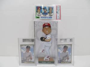 lot 64 image: Graded Hrbek & Rocco Baldelli Rookie Baseball Cards & Sonny Gray Bobblehead