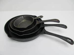 lot 72 image: Group of 4 Unmarked Cast Iron Skillets