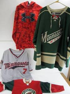 lot 168 image: Group of Qaulity MN Sports Jerseys & Under Armour Sweatshirt
