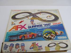 lot 292 image: Vintage AFX Sunrise 250 Slot Car Race Set w2 Cars