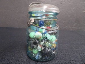 lot 47 image: VINTAGE BLUE JAR WITH VINTAGE MARBLES