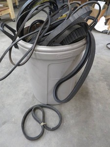lot 107 image: GARBAGE CAN FULL OF BRAND NEW BELTS