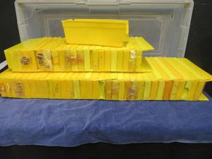 lot 112 image: LARGE YELLOW CONTAINERS & CHARMS