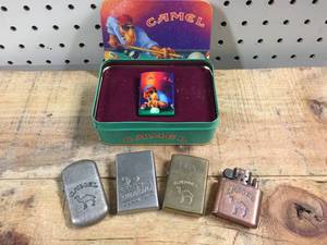 lot 140 image: Camel Themed Lighters - Zippo - Others