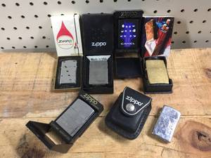 lot 142 image: 7 Collectable Zippo Lighters