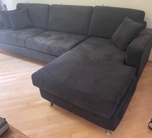 lot 67 image: Brilliant Black Microsuede Sectional