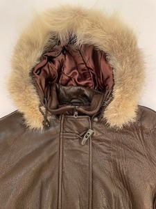 lot 159 image: Andrew Mark Brown Leather Coat with a Faux Fur Collar and Zip Off Hood