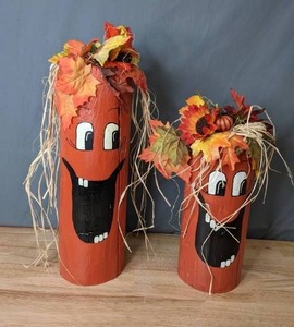 lot 186 image: Set of 2 Solid Wood Log Jack-O-Lantern Decorations - Z