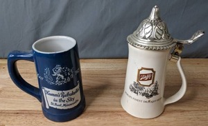 lot 134 image: Vintage Beer Collectables Hamms Rathskeller in the Sky Beer Mug and Schlitz Beer Stein - Z