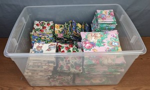 lot 243 image: Stacks of Hand-Sewn Fabric Coasters, Trivets and More - Z