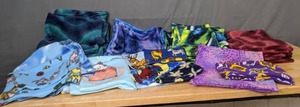 lot 198 image: Assortment of Unfinished Projects in Fun Patterned Fleece Fabric Cats, Vikings, Tie-Dye, Spiderman, & More - Z