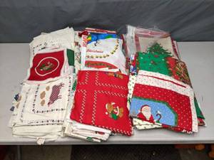 lot 310 image: Stack of Several Unfinished Cut and Sew Fabric Panel Projects in Christmas Fabric, Including Peanuts - Z