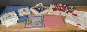 lot 298 image: Stacks of Pre-Cut, Unfinished Coasters, Hot Pads & More, & Cut & Sew Fabric Panels - Z