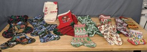 lot 291 image: Stacks of Handmade Christmas Stocking in a Variety of Fabrics - Z