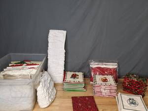 lot 293 image: Stacks of Handmade Christmas Hot Pads and Several Bolts of Eyelet Lace - Z