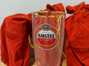 lot 20 image: 4 Brand New Amstel Light Premium Lager Beer Glasses - T
