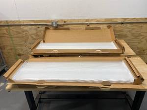 lot 41 image: LITHONIA LIGHTING Lot of 2-  49-12 in 128W 4-Light Fluorescent T8 Linear Ceiling Fixtures