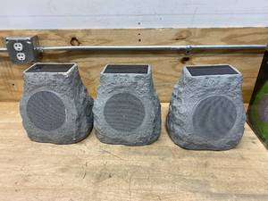 lot 84 image: ION Lot of 3 Glow Stone Solar Rocks LED Rechargeable Speakers