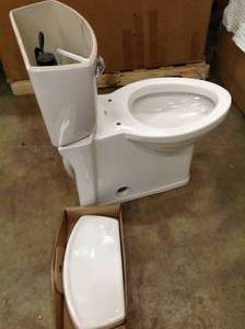 Reliant 2-Piece 1.28 GPF Single Flush Round Toilet with Slow Close Seat in White by American Standard Customer Returns See Pictures