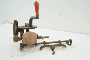 lot 26 image: antique grinding wheelsharpening stone
