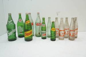 lot 38 image: assorted vintage glass soda bottles