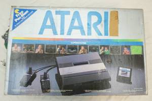 lot 62 image: vintage Atari Game System