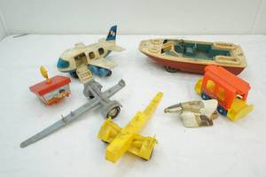 lot 82 image: vintage Tonka boat 16, and boat trailer