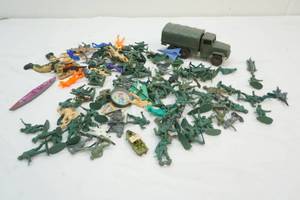 lot 93 image: military action figures and truck