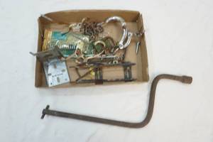 lot 108 image: vintage metal hooks and special tire iron
