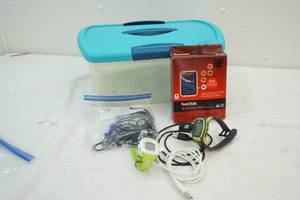 lot 158 image: Garmin watch, SanDisk sansa clip mp3 player
