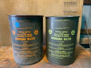 lot 126 image: Two Department of Defense Drinking Water Barrel 17 12 Gallon.  Survival supplies. 1962 and 1963