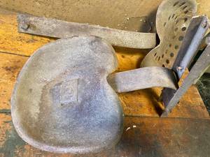 lot 139 image: Two Vintage Metal Tractor Seats