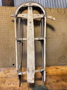 lot 142 image: Antique 42 Sled with Metal Tracks