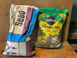 lot 148 image: Bag of Miracle Grow Soil and Alfalfa Seed
