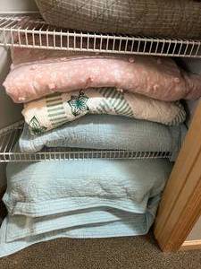 lot 8 image: Closet of Bedding
